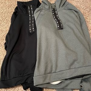 Two Nike half zip sweatshirts